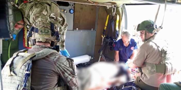 Cansız bedeni sarp kayalıklarda helikopterle indirildi
