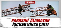 İşçiler vincin tepesine çıktı