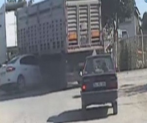 Oitomobil TIR'ın altına girdi