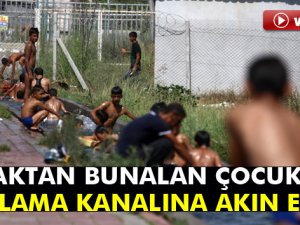 Adana'da çocuklar sulama kanalına akın etti