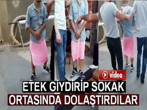 Uyuşturucu satıcısı olduğu iddia edilen kişiye etek giydirdiler.