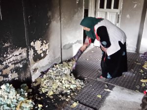 Akar ailesi yangında canını zor kurtardı
