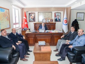 Başkan Er'den Rektör Pakiş'e ziyaret