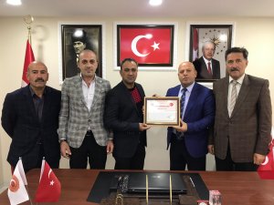 Başkan Er’den Sefer Çiftçi’ye Teşekkür Belgesi