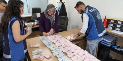 Dilencinin üzerinden 75 bin 950 TL çıktı